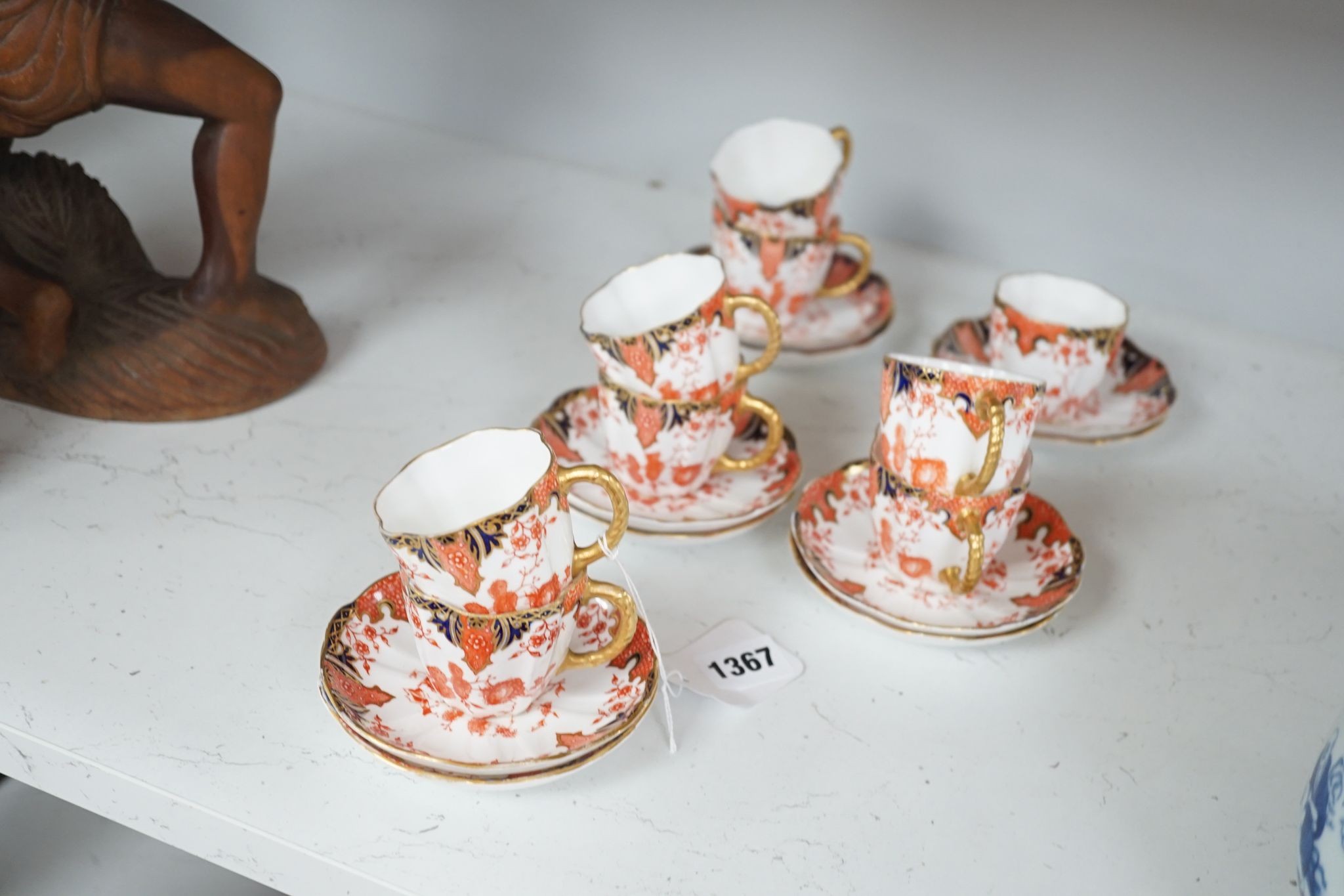 Eleven Royal Crown Derby porcelain Imari pattern 2712 coffee cups and twelve saucers
